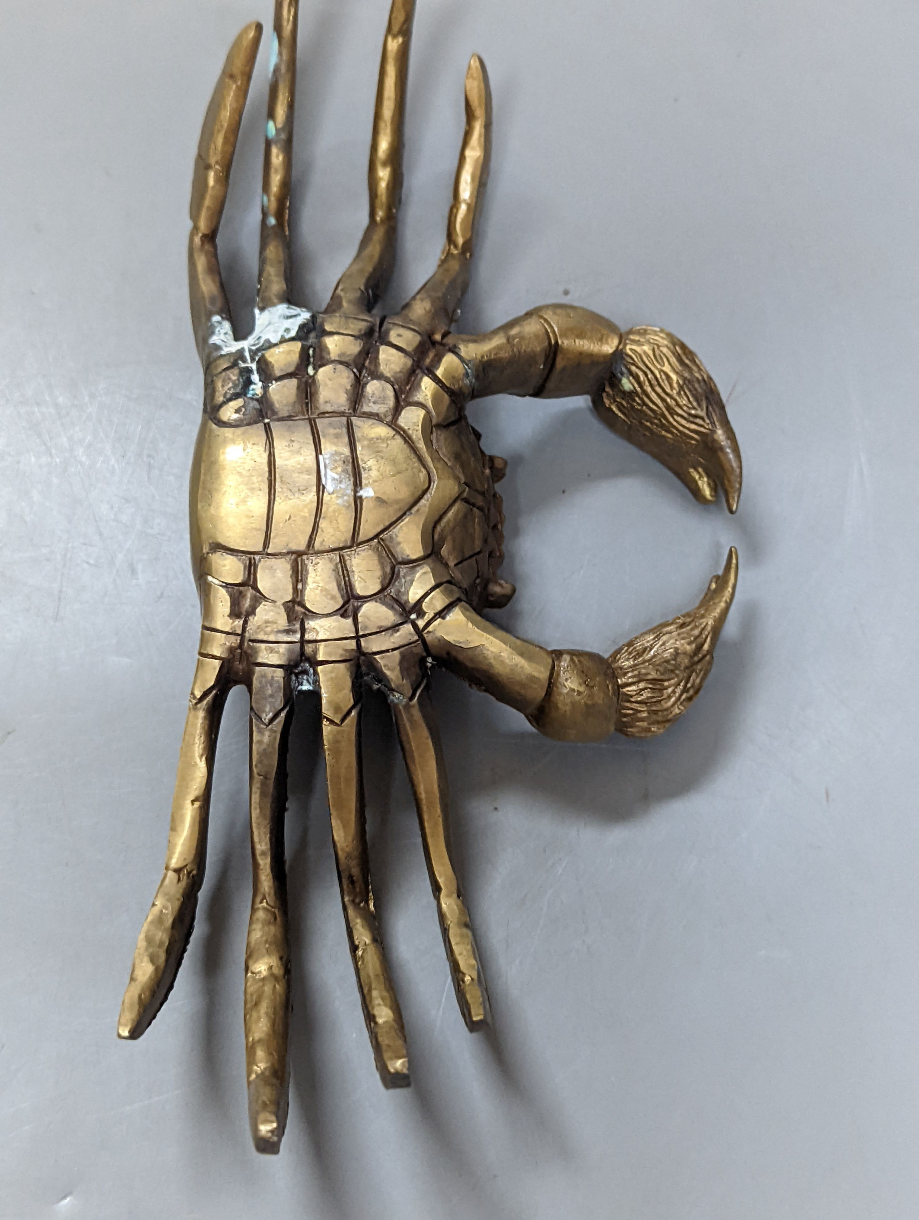 A pair of bronze crabs, largest 22.5 cms wide.